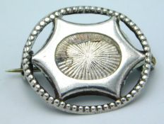 A Charles Horner silver brooch, loss to enamel, 21