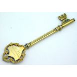A 1954, Birmingham silver gilt key by Thomas Fatto