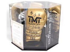 A cased boxing glove hand signed by former unbeate