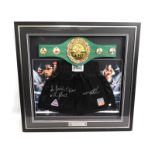 A cased pair of boxing shorts, hand signed by former world heavyweight champion 'Iron' Mike Tyson, a