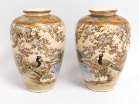 A pair of antique Japanese Satsuma vases with bird