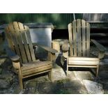 Shepherd's Hut: A pair of Adirondack style garden chairs, one chair has damaged slat
