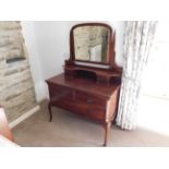 Blacksmith's Cottage: A mahogany dressing table wi