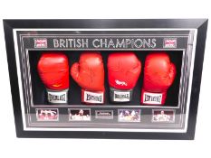 A cased British champion set of hand signed gloves