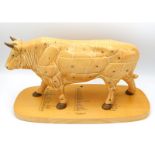 A Goebel butchers store porcelain steer showing meat cuts with original plinth, 14.75in wide x 7.75i