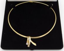 An 18ct gold necklace set with diamonds, pear shap