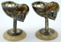 A pair of antique white metal mounted shell caviar