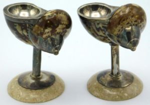 A pair of antique white metal mounted shell caviar