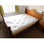 Gamekeeper's Cottage: A pine double bed with a Mat