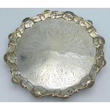 An early George III, 1763 London silver salver by Thomas Hannam & Richard Mills, 10in diameter. 469.