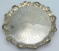 An early George III, 1763 London silver salver by Thomas Hannam & Richard Mills, 10in diameter. 469.