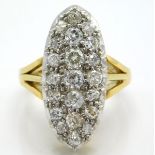 An 18ct gold Victorian style diamond ring set with