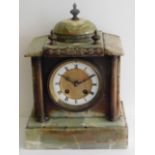 Tremaine Manor House: A c.1900 onyx mantle clock,