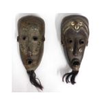 Two tribal art Liberian Dan masks, largest 13in hi