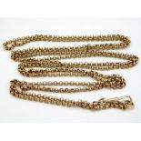 A Victorian 9ct gold long guard chain, 59in long,