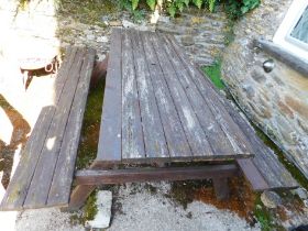 Ploughman's Cottage: A wooden picnic garden table,