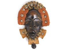 A Liberian tribal art Dan mask, 14in high overall