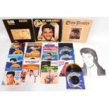 A collection of three Elvis Presley vinyl LP's twi