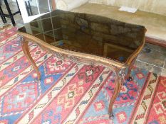 Tremaine Manor House: A mahogany coffee table with