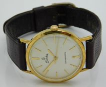 A yellow metal Sandoz gents wristwatch, case tests