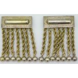 A pair of white metal masonic jewel apron tassels