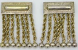 A pair of white metal masonic jewel apron tassels