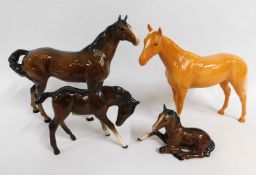 Two Beswick horses with Beswick foals. tallest 8.5