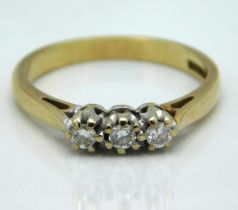 A 9ct gold ring set with three diamonds, approx. 0