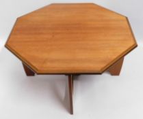 A teak octagonal coffee table, 31.5in across x 17i