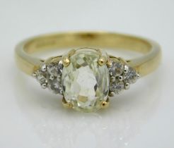 A 9ct gold ring set with diamond & possibly, a pal