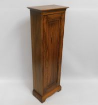 A lockable Ercol 'Golden Dawn' elm storage cabinet