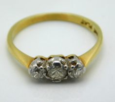 An 18ct gold ring with platinum set diamonds of ap