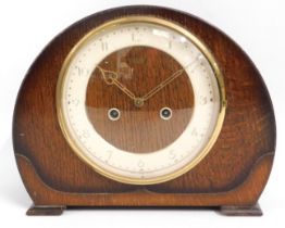 An early/mid 20thC. oak case mantle clock, 9,25in