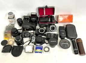 A quantity of various camera equipment including t