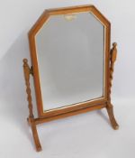 An antique oak barley twist framed mirror, 21.875i