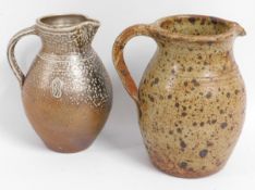 Two studio pottery jugs, indistinctly signed, larg