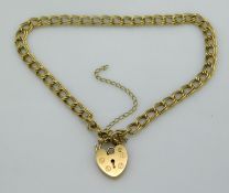 A 9ct gold double curb link bracelet, safety chain