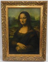 A framed canvas print of the Mona Lisa, 26.25in x