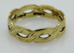 A 9ct gold band of flat wove design, 2g, size N/O