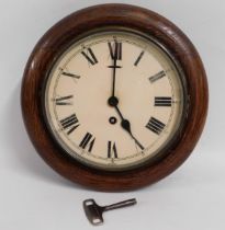 An oak cased Smiths school clock, not running, 11.