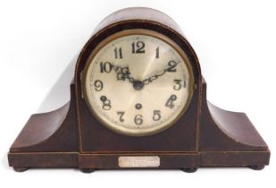 A Westminster chime mantle clock with applied silv