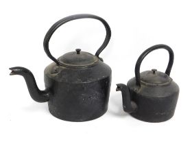 Two cast iron fireside kettles, largest 13in high