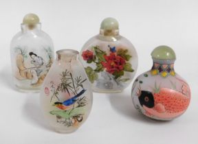 Four Chinese glass snuff bottles including one wit