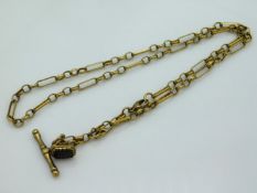 A 9ct gold chain with T-bar & mounted garnet fob,