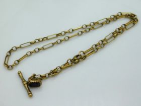 A 9ct gold chain with T-bar & mounted garnet fob,