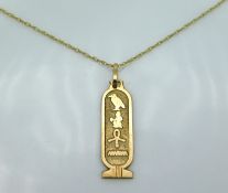 An 18in long 9ct gold chain with 35mm drop Egyptia
