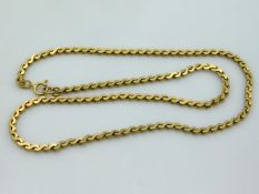 A 15in long 9ct gold serpentine link chain, 9.7g