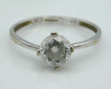 A 9ct white gold ring set with white paste stone,
