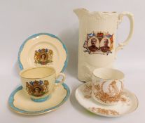 A Clarice Cliff QEII trio twinned with a Lord Kitc