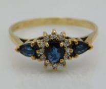 A 9ct gold ring set with diamond & sapphire, 2.4g,